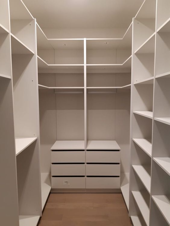 clean small walk in closet design